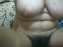 Asian Girl show her hairy pussy and big tits on