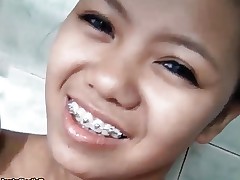 Lean tight-bodied Filipina teen with cute braces